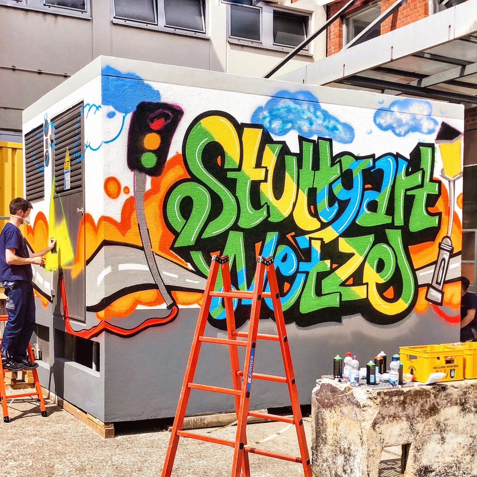 Team-Event-Gruppe vor dem Graffiti-Werk mit Open Mike