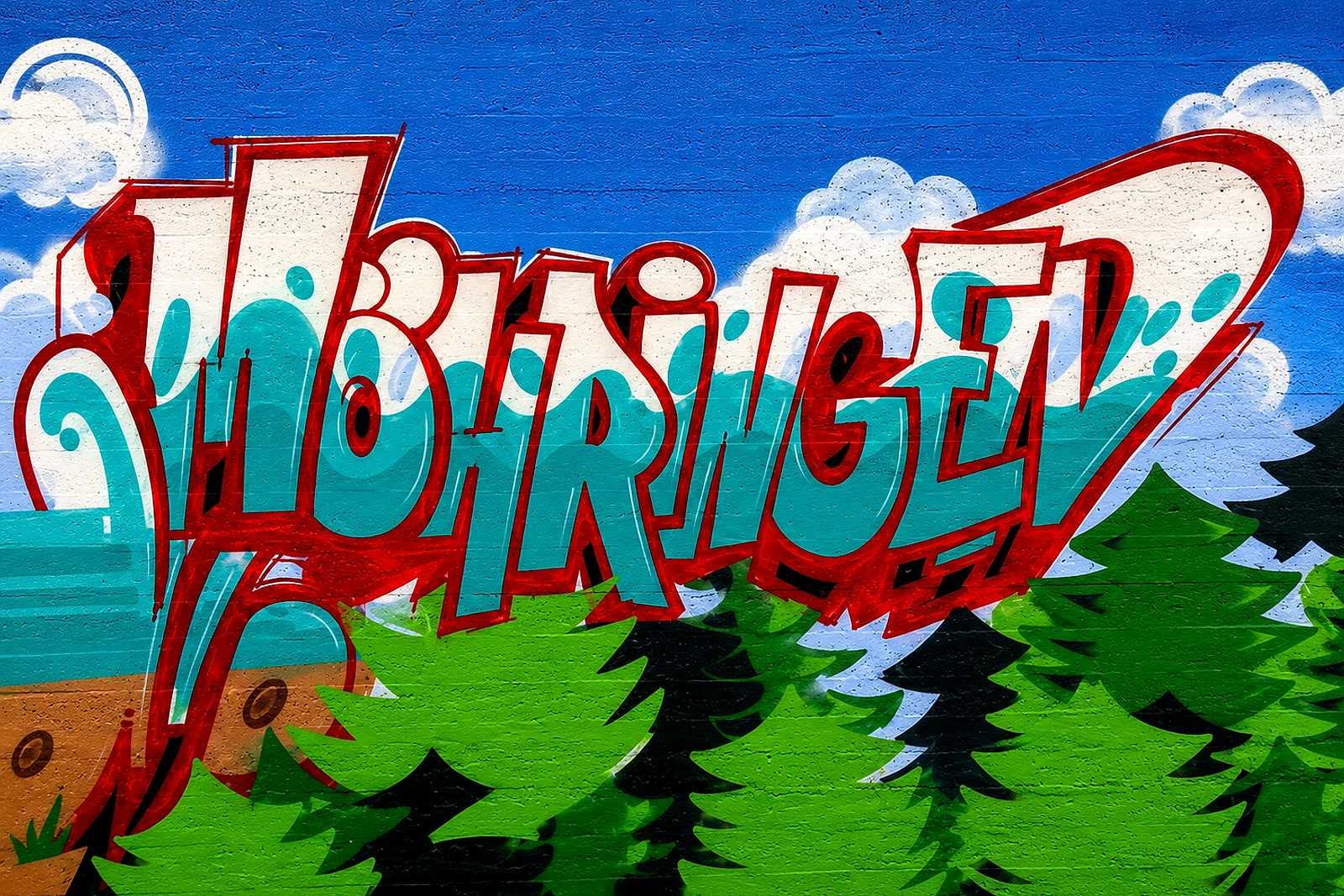 Detail: der Schriftzug »Möhringen« in Rot und Türkis über einem gemalten Tannenwald.