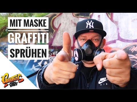 Maske tragen beim Sprühen